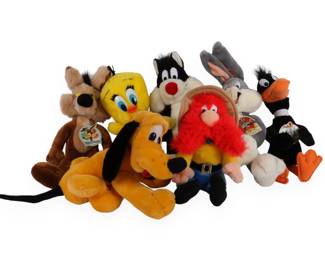 A Collection of Seven Disney and Warner Bros. Looney Tunes Plush Toys