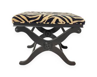 A Neoclassical Revival Ebonized Curule Stool with Zebra Upholstery