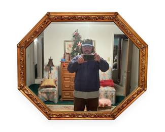 A Gilded Octagonal Wall Mirror, Ornate Revivalist Style