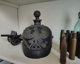 German ww1 helmet . And mini cannon
