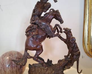 Large antique  Bronze  sculpture of prospector fighting puma.  