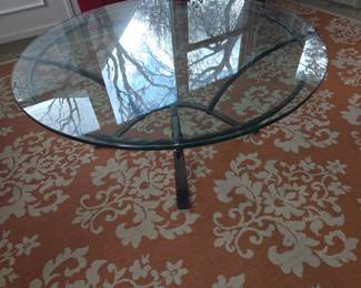 Round glass top cocktail table