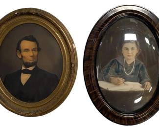 2 Oval Framed Portraits