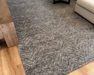 $1340      100% Wool 8'x10'  *Price includes rug pad