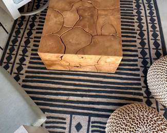 $180     "Blue and Tan Outdoor Rug - 6' x 9'
100% Polypropylene"	