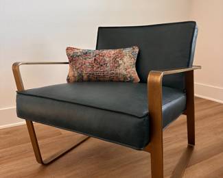 $850 each   Vintage peacock top grain leather with an exposed antique
brass steel frame.
26.5"W x 31"D x 27"H