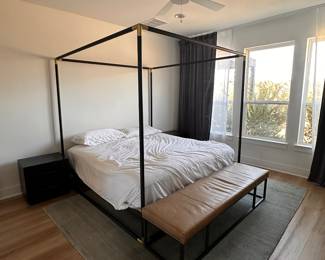 $480     "Frame Canopy Bed
Room: Master Bedroom
Matte black powder coated iron frame
Plated brass finish corners
Size - King"	