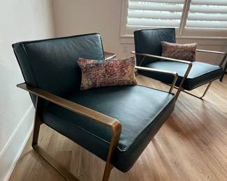 $850 each   Vintage peacock top grain leather with an exposed antique
brass steel frame.
26.5"W x 31"D x 27"H