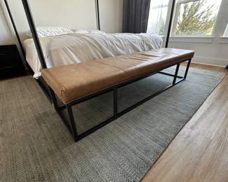 $580      "Taupe leather with gunmetal iron frame stand.
72""W x 20""D x 17""H"		