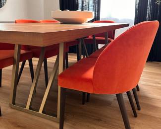 $1480      "Walnut Dining Table with Bronze Base
Room: Dining Room
Walnut table top with Antique bronze linear base.
96""W x 38""D x 30""H"		                                                                $240 each        "Spice Velvet Dining Chair
Room: Dining Room
Wood legs with dark charcoal brown stain
Spice cotton velvet blend
20""W x 18""D x 31""H"		