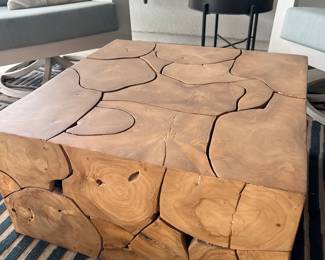 $400     "Outdoor Teak Root Table
Laminated Teak Root
Reflective or natural materials, tables will vary from piece to piece
30"" sq x 15""H"		