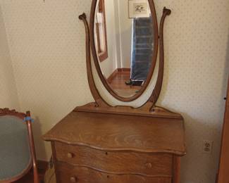 017	Antique Oak Serpentine-Front Dresser with Swivel Mirror	35.5"x20"x71
