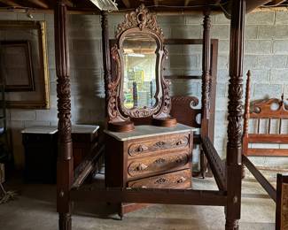 Antique pineapple bed, shown with period dresser