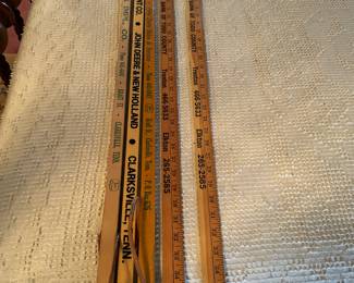 Yard sticks from local advertisers 
