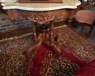 This is a large collection of Belter and Belter style furniture. 
The original auction description is onsite for this table. 