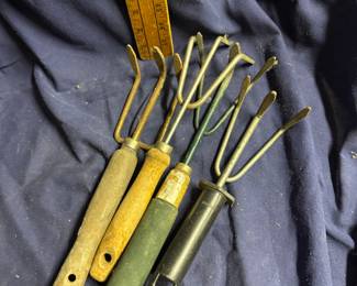 4 Hand Rakes $4.00