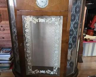 KO283VVintage curio cabinet with clock