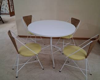 Arthur Umanoff mid-century modern wrought iron dinette set with a round table and four chairs. $350