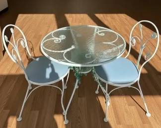 Wrought Iron Bistro Table with Glass Top and Two Matching Chairs