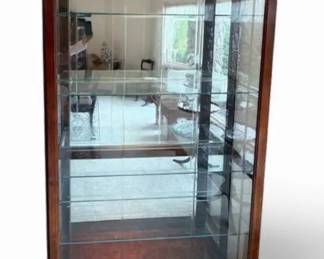 Howard Miller Lighted Collectors Curio Cabinet  Mirrored Back, Glass Shelves