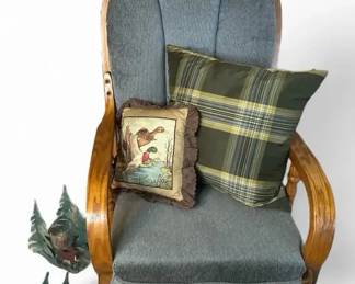 Glider Rocker with Cushions and Metal Pine Tree Decor