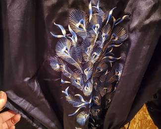 Peacock design on the back of the robe