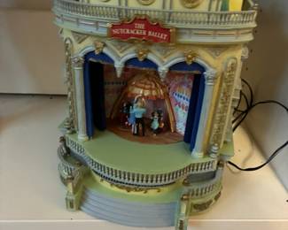Mr. Christmas animated Nutcracker Suite music box-- features multiple scenes from the ballet with dancing figurines.  Works great!