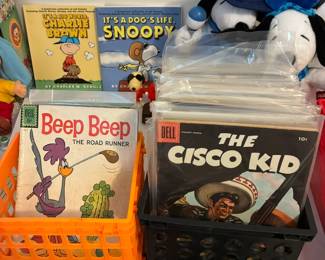 A lively assortment of vintage comics with iconic characters and retro cover art.