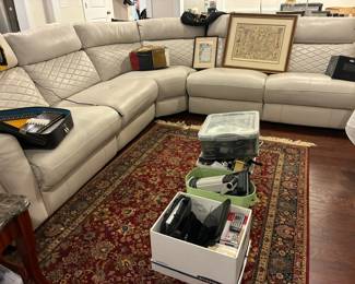 Please note- the items in the boxes on the floor are not available due to personal security reasons.  This photo is only posted in order to show the sectional couch.  