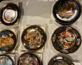 Decorative plates painted with various Slavic art scenes