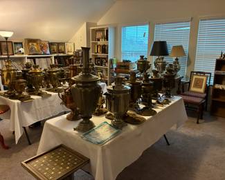 A striking assortment of traditional samovars in a variety of metals and styles — beautiful display pieces and wonderful additions to any collection.