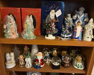 Beautifully crafted Christmas figures in a variety of styles — from classic Father Frost designs to charming snow globes