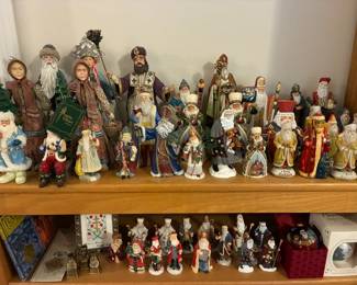 A delightful mix of Christmas figurines inspired by Slavic folklore — including carved Santas, Babushka, and the Snow Maiden.