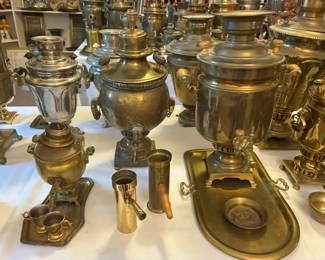 An impressive array of samovars, ideal for display, restoration, or repurposing in home décor.