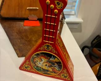 Balalaika shaped musical tin