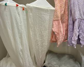 Hanging bed canopies and mermaid tail blankets