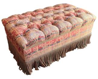 Tufted ottoman with fringe