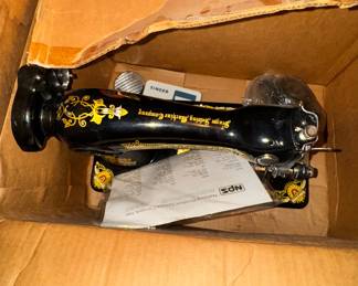 Vintage sewing machines and cast iron stand and table 