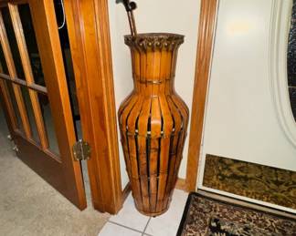 Numerous coat racks and umbrella holders.