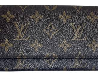 A LOUIS VUITTON Monogram Wallet
