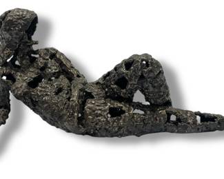 Brutalist Metalwork Lounging Woman
