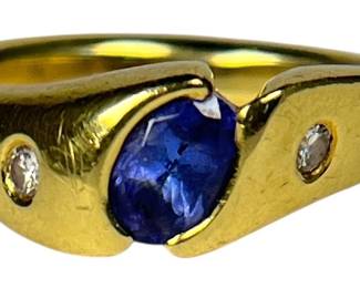 An 18k Gold, Diamond, and Tanzanite Ring
