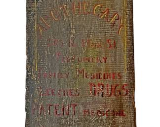 A Vintage Apothecary Advertisement Sign
