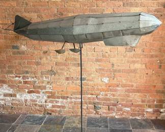 A Large Model Zeppelin Blimp Sculpture on Stand