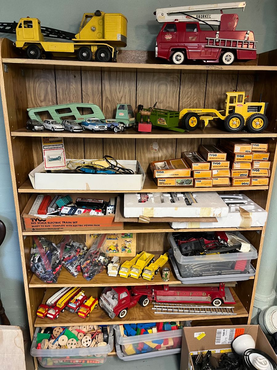 Intake toys, including Tonka and Nylint vehicles, model trains, and more.
