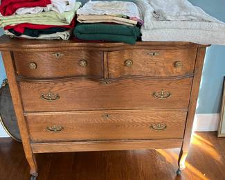 Antique serpentine dresser/chest.
