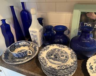Vintage glassware, pottery and dinnerware, including a large selection of cobalt blue glass.