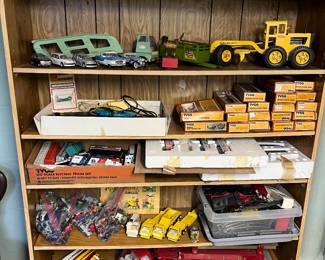 Intake toys, including Tonka and Nylint vehicles, model trains, and more.