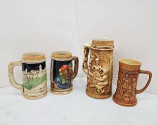 	Four Ceramic Beer Steins