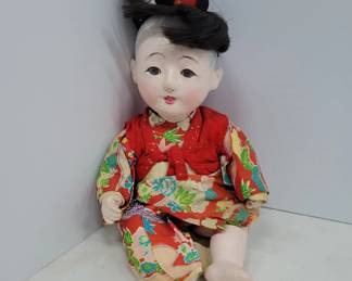 	Japanese Doll with Cracked Body